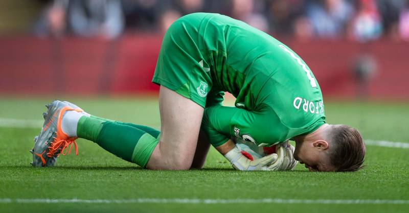 Why do goalkeepers fall to the ground?