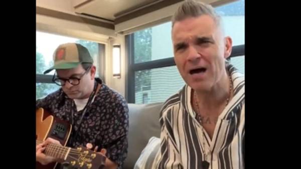 Robbie Williams sings a special version of his hit ‘Angels’ dedicated to Ange Postecoglou after Spurs fans reworked the lyrics to praise the Aussie manager