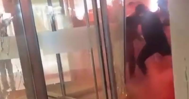 Feyenoord spark Ajax meltdown as raging ultras attempt to smash through main entrance after game ABANDONED
