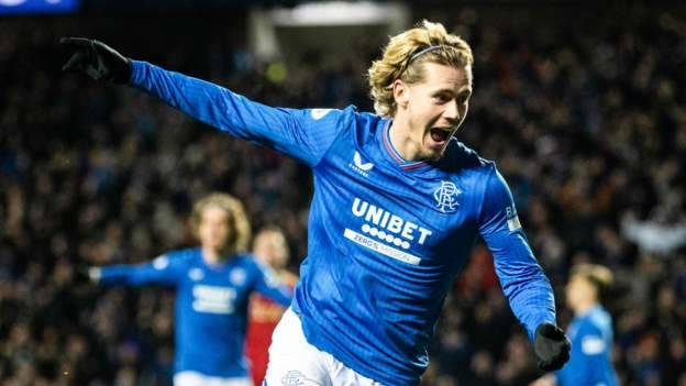 Rangers go joint top as Warnock loses first game