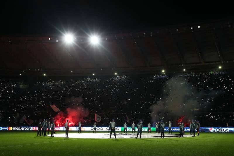 Lazio-Celtic marred by crowd trouble as fans throw flares at each other